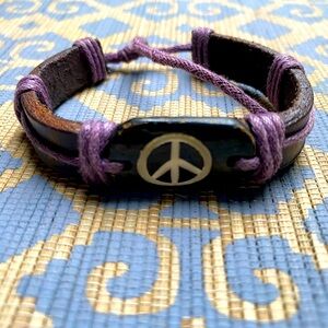 Leather, wood and cord bracelet.